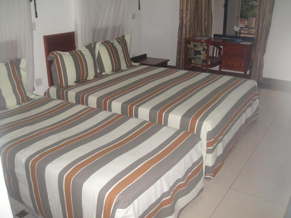 Arc Hotel Morogoro Szoba fotó